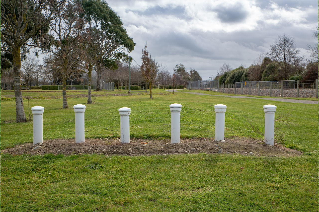 Image of septic tank pipes sticking out of the ground after a  Septic System Installation Pekin, IL
