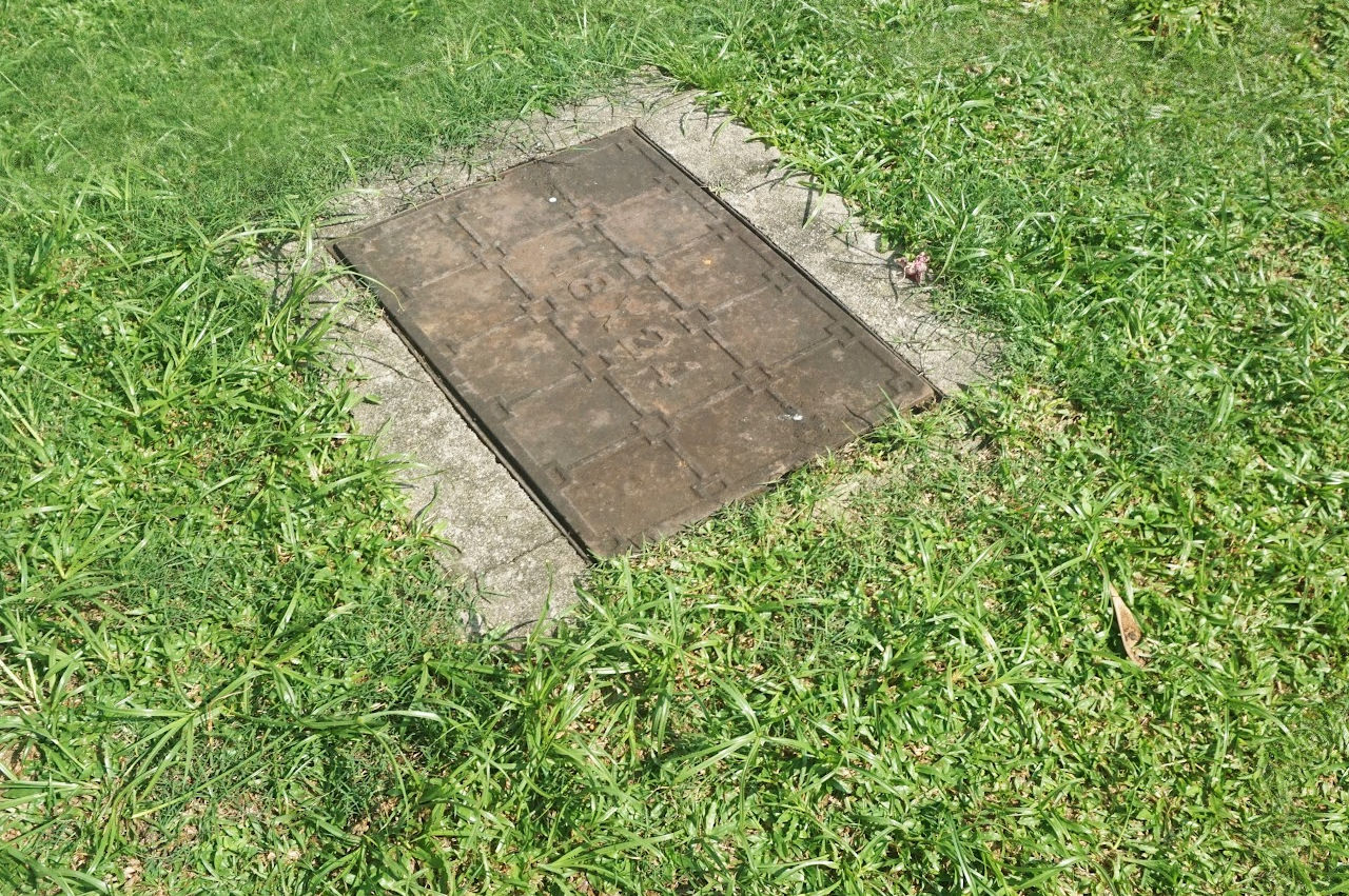 image of the top of a septic tank man hole cover