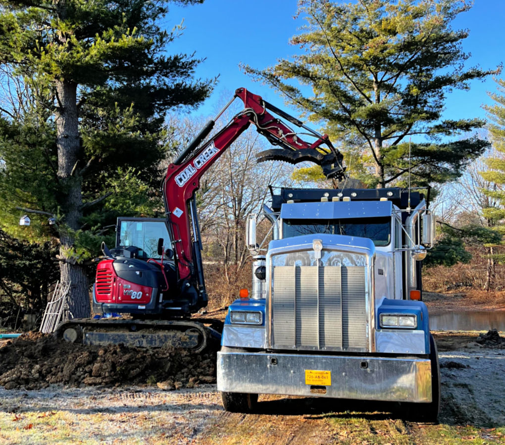 image of Coal Creek Excavating & Septic excavator image of Coal Creek Excavating & Septic excavator