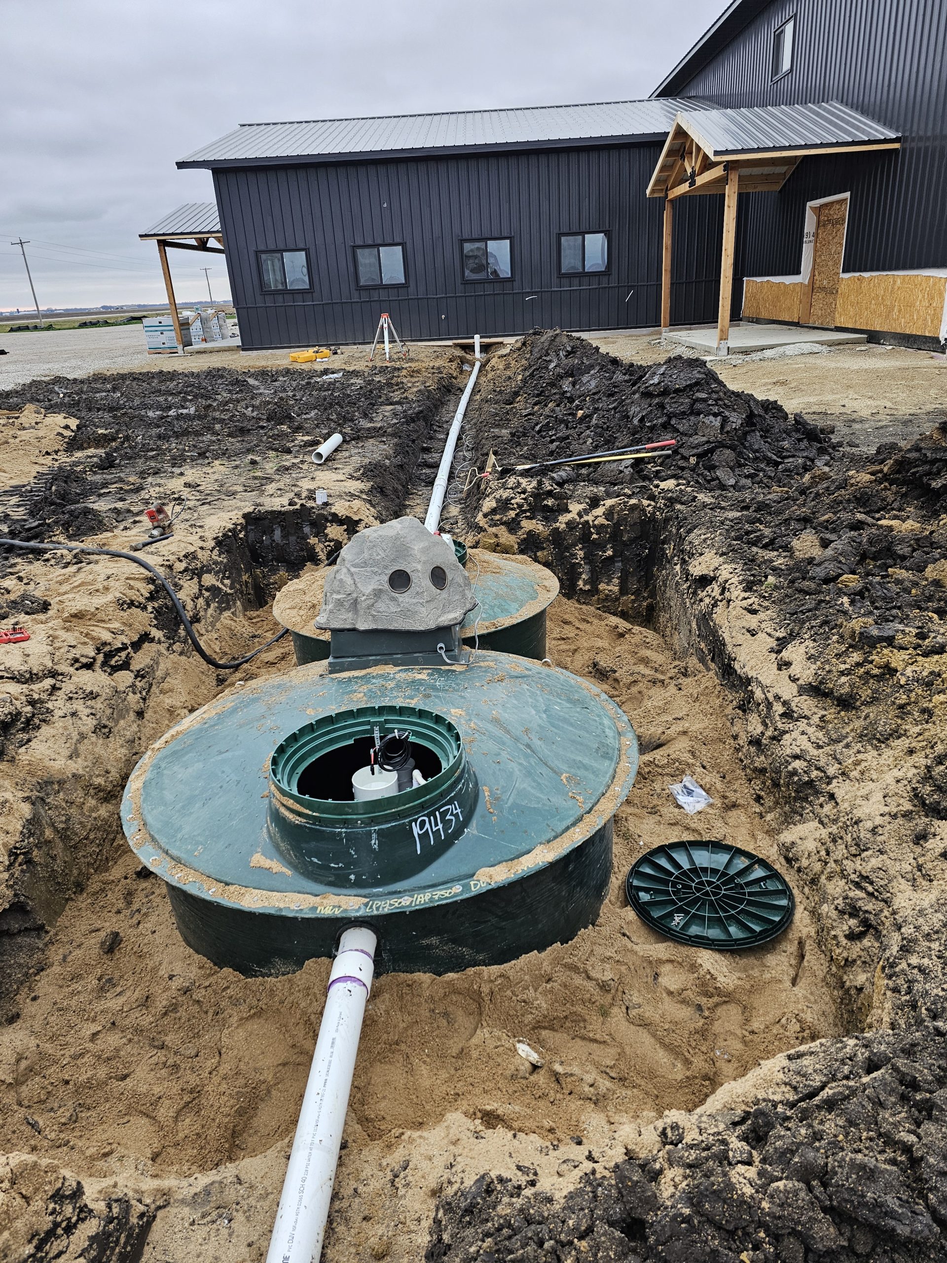 Rumbold, Wyoming_(7) Septic tank installation beside a building